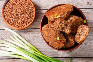 Healthy vegetarian food background photo . Fried buckwheat cutlets