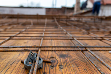 Web of metal rebar or armature steel  on the construction site, concrete plate is about to be made,...