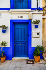 Fototapeta na wymiar blue house in the historic Santa Cruz district of Alicante Spain
