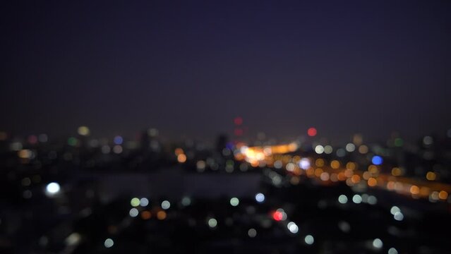 Blurred of night city skyscraper and tower lights bokeh , Soft Focus , Metropolis Backgound wallpaper