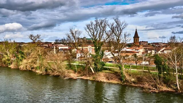 Alphonse Jourdain Street on the embankment of the river Tarn in Montauban. Montauban is commune in Tarn-et-Garonne department in Occitanie region in southern France.