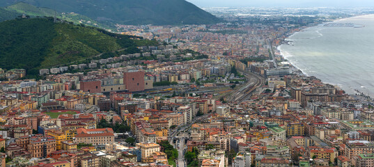 Densely populated areas of the Italian city of Salerno. Salerno is a city and port on the Tyrrhenian Sea in southern Italy, the administrative center of the Salerno province of the Campania region.