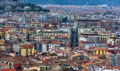 Fototapeta na wymiar Densely populated areas of the Italian city of Salerno. Salerno is a city and port on the Tyrrhenian Sea in southern Italy, the administrative center of the Salerno province of the Campania region.