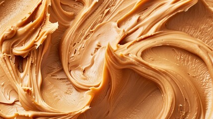 Creamy peanut butter as background, closeup. Food background