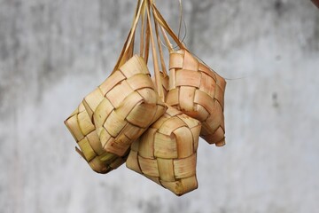 Close up of Ketupat and copy space with isolated blurred background. Traditional culture in indonesia welcoming ramadhan season
