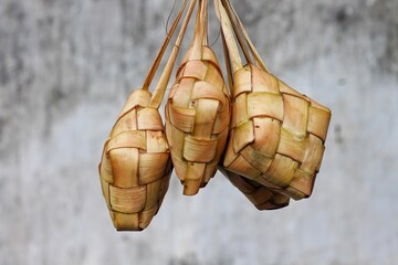 Close up of Ketupat and copy space with isolated blurred background. Traditional culture in indonesia welcoming ramadhan season