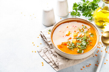 Red lentil soup, traditional middle eastern food on white background. Top view with space for design. - 790809403