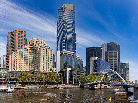 Melbourne, Australia - February 18, 2024: Tallest Melbourne skyscraper Eureka tower dominates South Yarra cityscape over Yarra river 