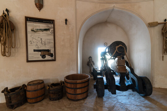 Rustaq, Oman - February 14 2023:  cast-iron ancient cannon are displayed inside Al Hazm castle and fort that dates back to 1708 in the Arabic peninsula.