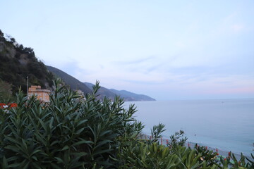 Seaside Sunset Over Rolling Hills