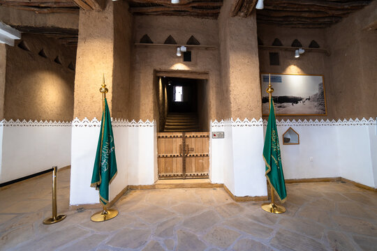 Riyadh, Saudi Arabia - February 10 2023: National flags displayed in the Interior of the Masmak fort in Riyadh old town in Saudi Arabia capital city.