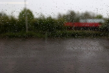 Rainy weather. Raindrops on the window glass