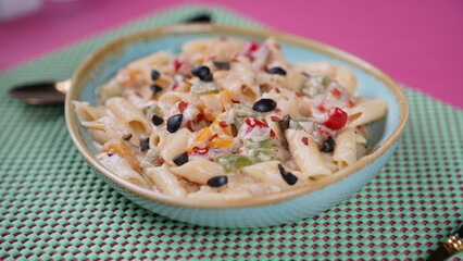 Delicious Pasta Preparation - International Cuisine - Served Beautifully on a pink matt - Ready to...