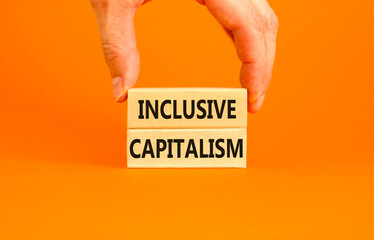 Inclusive capitalism symbol. Concept words Inclusive capitalism on beautiful wooden blocks....