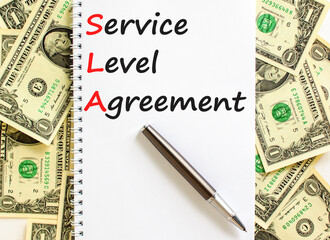 SLA service level agreement symbol. Concept words SLA service level agreement on beautiful white...