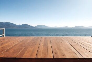 Wooden deck overlooking a scenic ocean view with mountains in the background