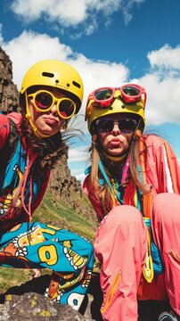 Adventure buddies on a thrilling mountain hike, summit selfie, shared triumph  11