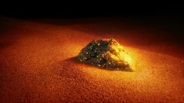 Shiny Metallic Rock In The Sand Valuable Rare Mineral