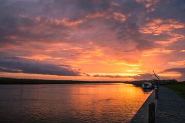 A spectacular sunset over the River Waveney at Herringfleet, Suffolk, UK