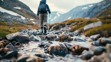 Feet walking on the river. Man in the forest. Exercise in nature with closeup. Mountain climber and athlete walking along the path in the forest. Relaxing and peaceful.