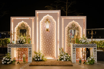 decoration of a wedding ceremony with original details and candles.