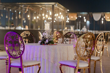 decoration of a wedding ceremony with original details and candles.