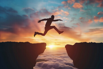 Silhouette of man jumping over a gap at sunset, concept business success and achievement - obrazy, fototapety, plakaty