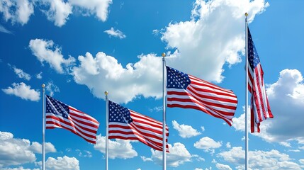 american flags waving in the wind against blue sky and clouds