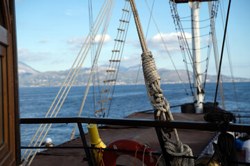 Front deck of a sailing ship with ropes, mooring lines and tow lines