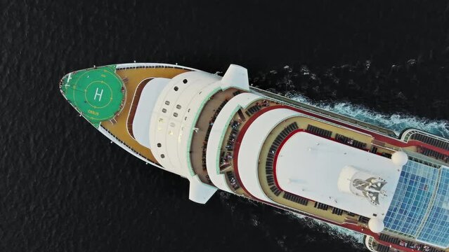 Sailing large cruise ship in sea aerial top view, 4k