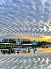 Serene waters: a dance of clouds and water