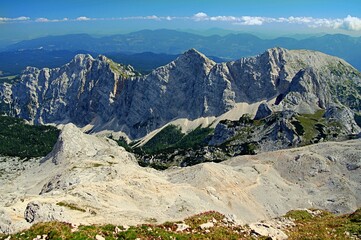 Panorama of the Julian Alps seen from the top of Triglav, Slovenia, beautiful mountainous rocky view