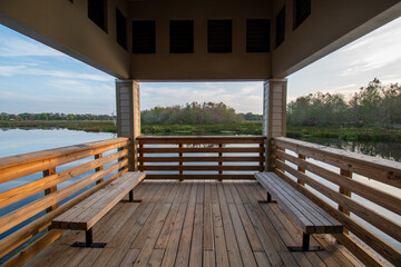 Boardwalk and visitor center at Green Cay Nature Center and Wetlands in Boynton Beach, Florida at sunrise.