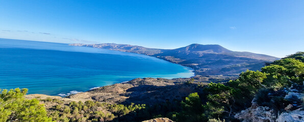  A  Panoramic View of the mediterranean Sea from the Summit of a Towering Peak.  seascape view of blue ocean and mountains and dense forest from hilltop. Canastel Oran Algeria.