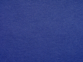 A canvas of sapphire blue, its textured surface evokes the tranquil depths of a twilight ocean