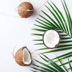 coconut with leaf on white background