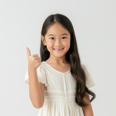 little girl showing thumbs up