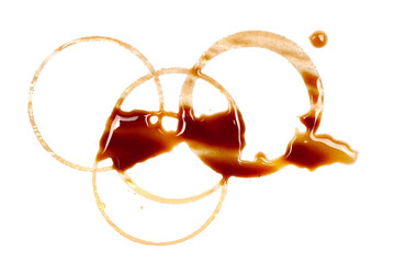 Spilled instant coffee with foam, stains with circle print isolated on white background, top view