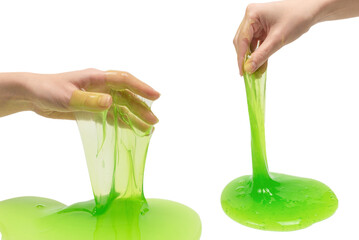 Green slime toy in woman hand isolated on white background.