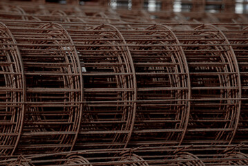Stainless Steel wire Rolls in construction site.Closeup of wire mesh Metal Steel reinforced rod for concrete in store.Construction Concept.