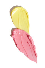 Pink and yellow cream smears on empty background