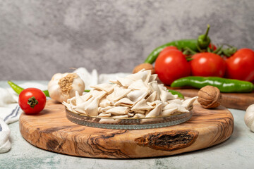Frozen ravioli. Delicious uncooked ravioli in a bowl