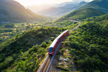 beautiful aerial view of train on the mountain railroad