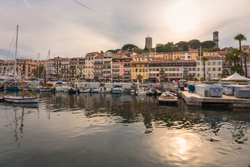 Fototapeta na wymiar The embankment of Cannes with boats - France