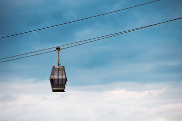 Suspended in the air, the gondola glides effortlessly along the steel rope, creating a sense of...