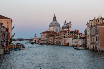 Panoramic sunset view of Grand Canal in city of Venice, Veneto, Italy, Europe. Famous landmark...