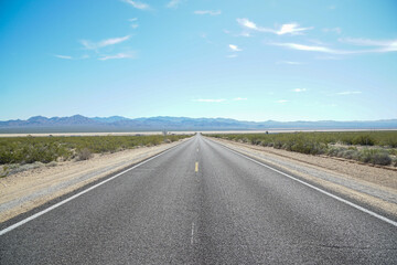 The long, lonely, road to no where in the middle of the Mojave Desert, California.