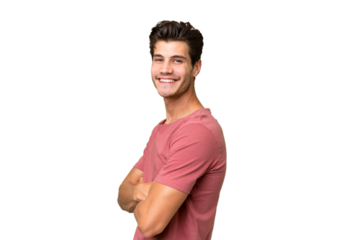 Young handsome caucasian man over isolated background with arms crossed and looking forward