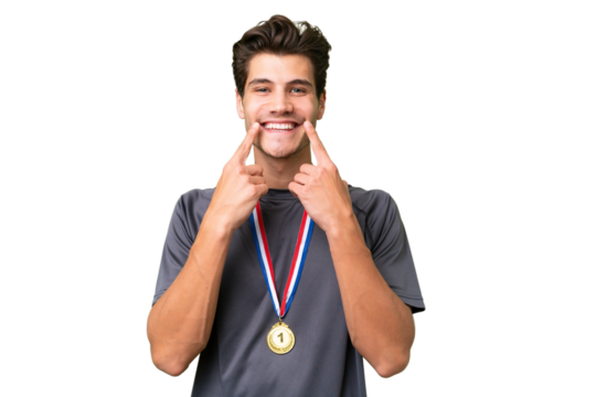 Young caucasian man with medals over isolated background smiling with a happy and pleasant expression - Powered by Adobe
