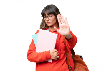 Young student caucasian woman over isolated background making stop gesture and disappointed